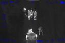 Thermal footage from the police helicopter showed the men being arrested