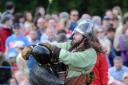 Battle re-enactments on the island at the rear of Caerphilly Castle (33179774)