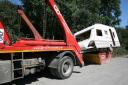 BIZARRE: The 1.3 tonne vehicle had been placed on the skip in an area of Newport last week.