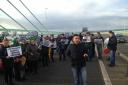 PROTEST: Demonstrators on the bridge this afternoon