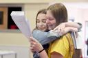 GCSE Results Cwmbran Rebecca Underwood 16 from coed Eva celebrates her 1 A* 3A's, and 5 B's with her  sister Emma aged 15 who also got 1B and 3C's a year early