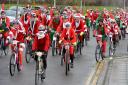 St David's Hospice Care santa cycle ride sets off on their 25 mile ride.  www.christinsleyphotography.co.uk