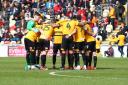 TOGETHER: The spirit within the camp could see Newport County earn a place in the League Two play-offs this week