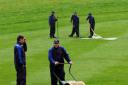 UNSUNG HEROES: The Celtic Manor ground staff clear the water from the course