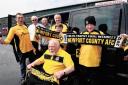 CHAUFFEUR-DRIVEN: Newport County fan Ken Fletcher, front, with, from left, Bob Herrin, chairman of Newport County Supporters; driver Roy Johnson; Mr Fletcher’s son Christopher Fletcher; Jeff Challingsworth, secretary of the supporters’ club; and Mr