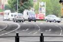 WRONG WAY: The silver hatchback goes anticlockwise around the roundabout