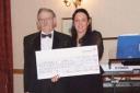 John Letts, past Charity Chairman, presenting the Foresters’ cheque to Helen Lloyd of Sparkle.