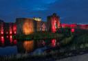 Caerphilly Castle lit up red to support Wales in the Euro 2020 last 16. Picture: RICHARD JONES