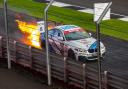 The car caught fire towards the end of the race (Picture: Peter Markwick)