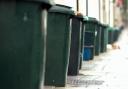 Stock picture of wheelie bins and recycling boxes.