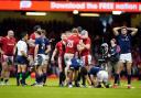 Wales players celebrate as they win a late penalty. Picture: PA