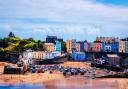 The buying of second homes in scenic Welsh communities, such as Tenby, Pembrokeshire, has added fuel to Wales's housing crisis in recent years.