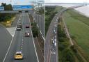 Protesters have been causing delays and disruption on the M4 over the rising cost of fuel. Pictures: PA Wire (left)/@wro_diana via Twitter (right)