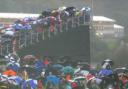 TORRENTIAL: The rain didn't stop some spectators enjoying the golf