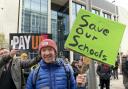 A teacher joins protesters at a TUC rally in central Cardiff on February 1, 2023.