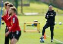 Wales manager Rob Page (right) during a training session at Vale Resort, Hensol. Picture date: Monday March 27, 2023.