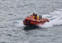 Tenby RNLI's inshore lifeboat was launched after reports that a woman was cut off by the tide.
