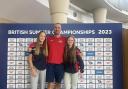 Tom Croke, head coach at Torfane Dolphins, with (L-R) Carys Croke and Meghan Willis. Picture: Suzanne Willis/Cwmbran Life