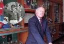 David Watkins in the old trophy room at Newport RFC and inset in his playing days for Wales