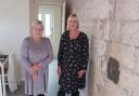 Glenys Williams (left) (pictured with her sister Sylvia) has been left homeless after a major leak was discovered on her roof