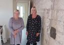 Glenys Williams (left) (pictured with her sister Sylvia) has been left homeless after a major leak was discovered on her roof