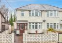 The property has an enclosed front garden
