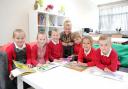Cefn Fforest Primary school of the week. In the family and Community Links room a Cefn Fforest Primary school L-R Holly Harvey 6, Alesha Wilkins 6, Riley Chaffey 5 , Miss Pride, Jack Bishop 6, Carys Edwards 6 and Finlay Stevens 7.
