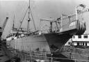 CABLE-LAYER: The John W Mackay in dry dock at Newport