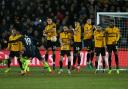MEMORIES: The Newport County players defend a free-kick from Manchester City star Leroy Sane on Saturday. Picture: Huw Evans Agency