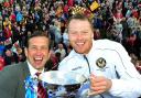 HEROES: Justin Edinburgh, left, and Michael Flynn celebrate promotion for Newport County in 2013.