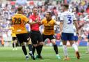 APPEALS: Newport County's Mickey Demetriou and Matty Dolan try to convince referee Ross Joyce to give a penalty at Wembley in May