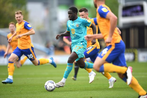 South Wales Argus: ENERGY: Chris Missilou drives forward for Newport County