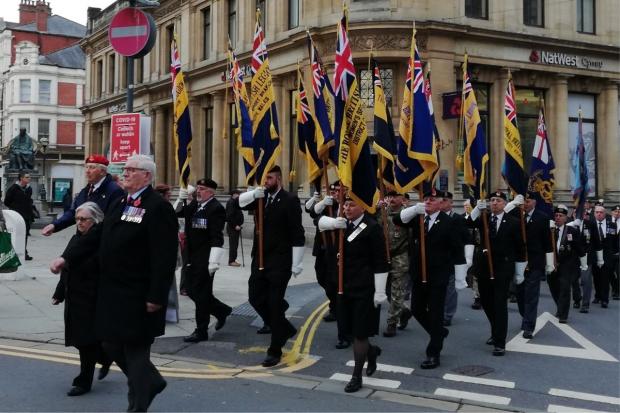 South Wales Argus: Members of the Royal British Legion march through Newport as the charity is granted the freedom of the city.