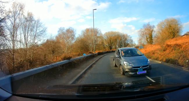 Dramatic dashcam footage captured Shaun Bayliss nearly crashing into a car head-on after coming around a bend. Picture: CPS Wales