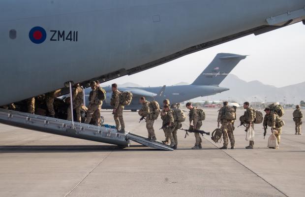 South Wales Argus: Ministry of Defence handout photo (via PA) of UK military personnel onboard a A400M aircraft departing Kabul, Afghanistan, in August.