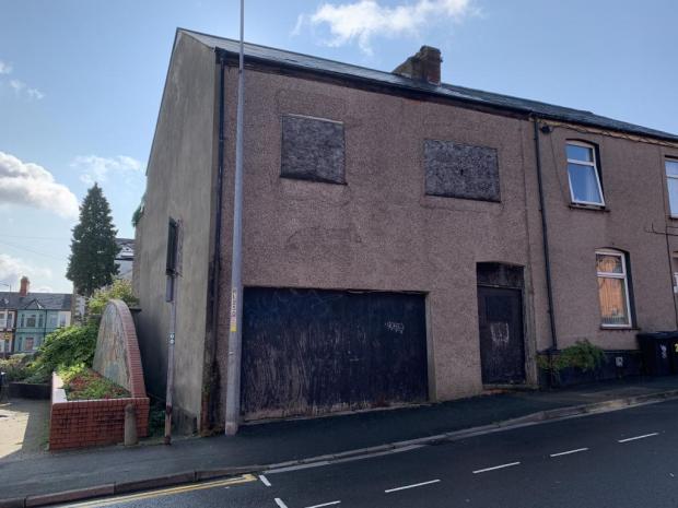 South Wales Argus: All of the doors and windows have been boarded up (Credit: Auction House South Wales)