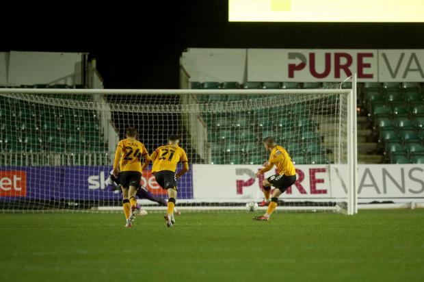 South Wales Argus: COOL: Matty Dolan sweeps home the penalty