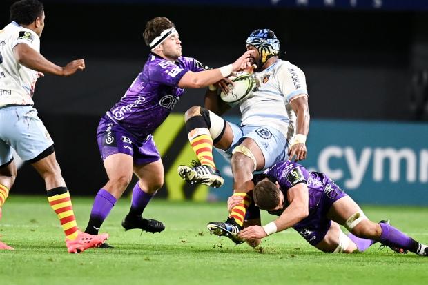 The Dragons in defence against Perpignan
