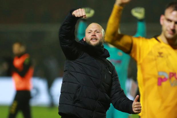 South Wales Argus: JOY: Manager James Rowberry celebrates County's win over Port Vale with the fans