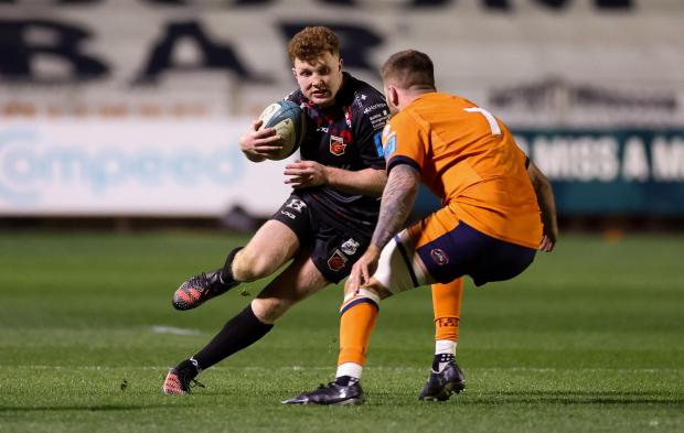 South Wales Argus: TALENTED: Aneurin Owen on the run for the Dragons
