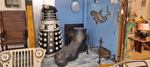 South Wales Argus: The shop is full of life-size figures such as this Dalek.