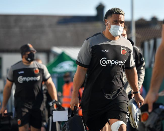 Dragons players wearing face coverings - but the game against the Ospreys has been postponed