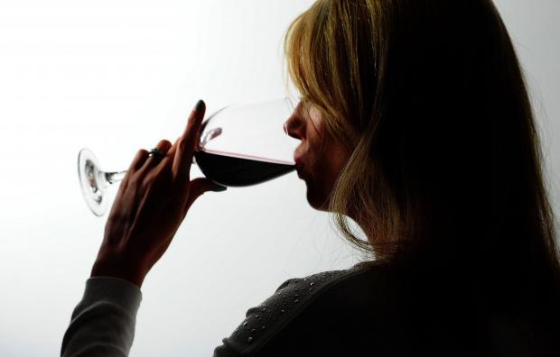 South Wales Argus: A woman drinking red wine. Credit: PA