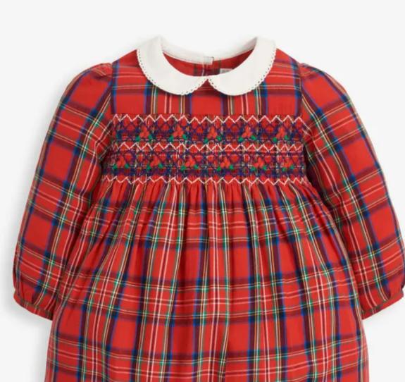 South Wales Argus: Girls' Red Tartan Smocked Party Dress. Credit: Jo Jo Maman Bébé South Wales Argus: Girls' Red Tartan Smocked Party Dress. Credit: Jo Jo Maman Bébé