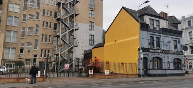 South Wales Argus: How the mural on the side of Mischief's now looks. Photo: Rebecca Wilks