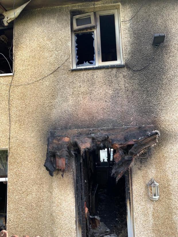 South Wales Argus: What used to be the front door of the house on Tranch Road after a fire on Friday. Picture: Maria Richards.