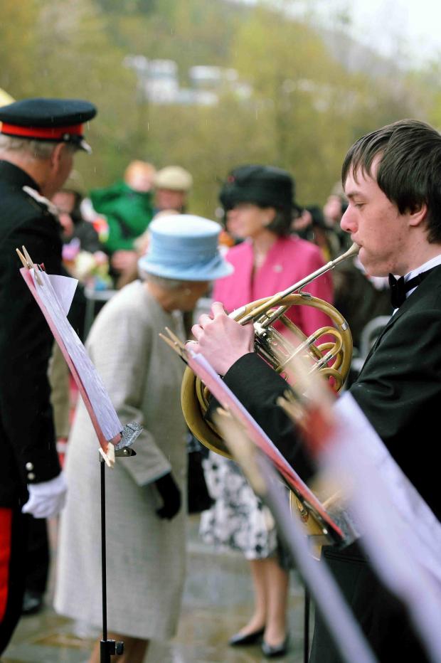 South Wales Argus: SWA MIKE LEWIS 27 4 12 REPORTER RUTH
THOMAS DURBIN PLAYS A FRENCH HORN  FOR THE ROYAL VISIT AT THE WORKS IN EBBW VALE