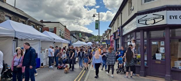 South Wales Argus: Crowds and stalls lined Cardiff Road in the town centre to sample the tasty food on offer.