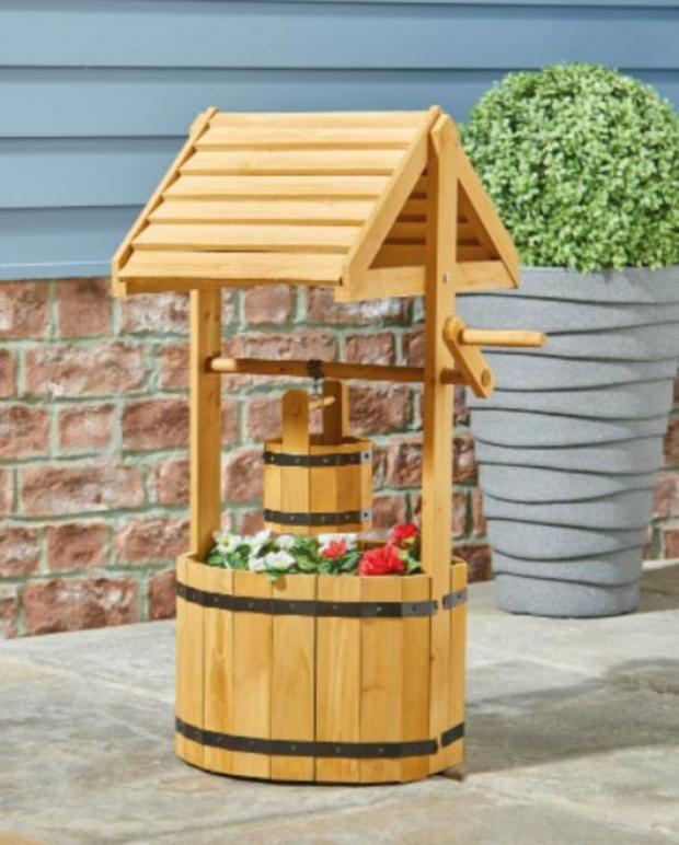 South Wales Argus: Natural Wooden Wishing Well Planter (Aldi)