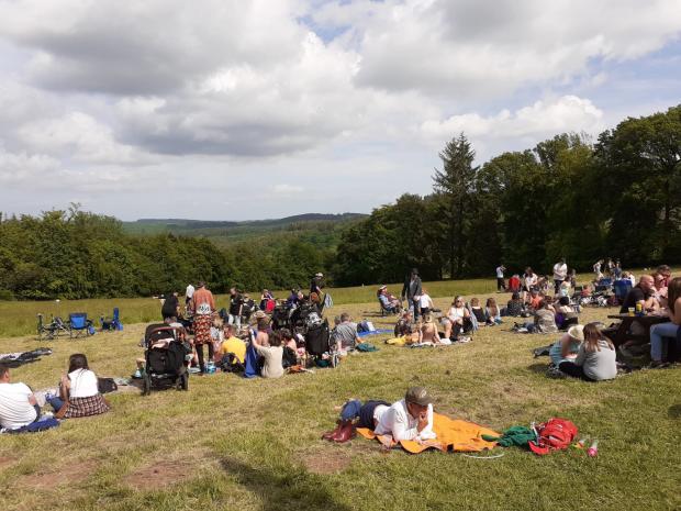 South Wales Argus: Crowds enjoying the weather at Devauden Festival.